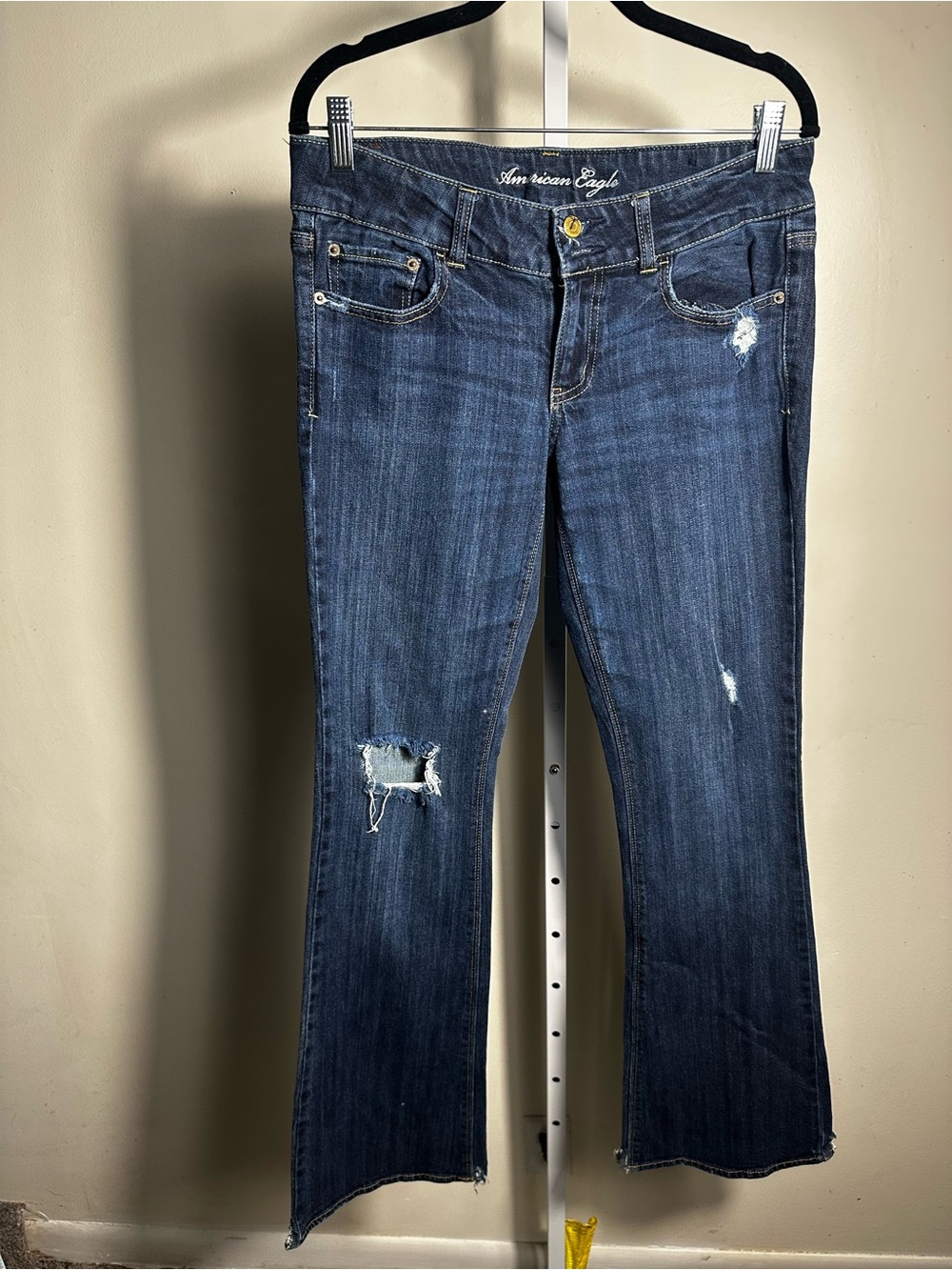 J74. American Eagle Outfitters Dark Blue Distressed Flare Jeans size 8